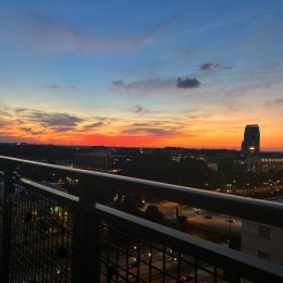 a balcony view at sunset