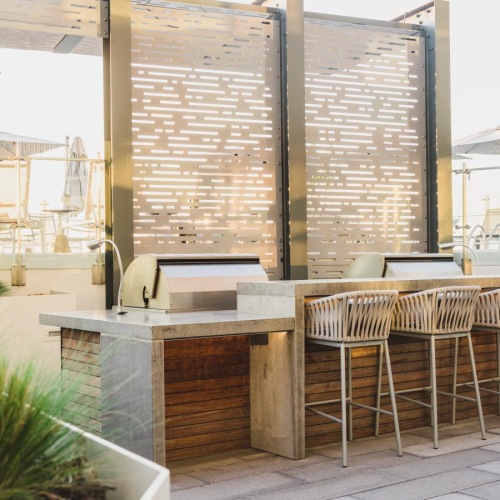 a patio with tables and chairs